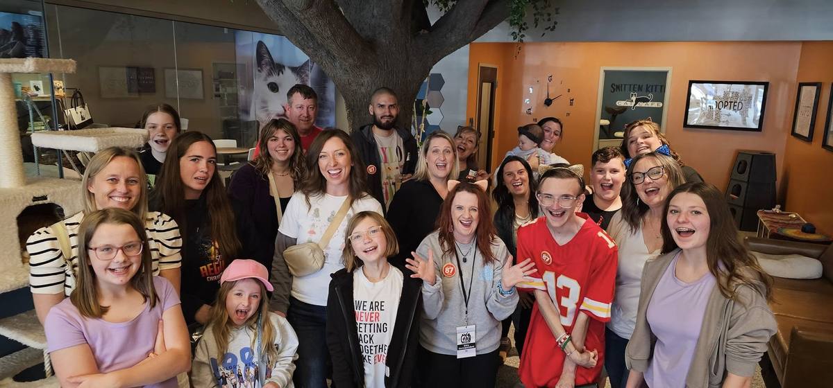 Joyful group at Smitten Kitten Cat Cafe